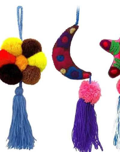 Handmade cotton stuffed ornaments. Can be used as an ornament and to mark luggage!