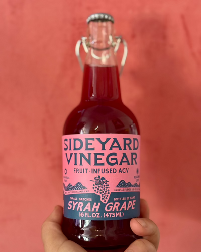 Syrah Grape Fruit-Infused Vinegar perfectly preserves the flavorful one-two punch of rich opulence and lively, high-toned pizzaz characteristic of estate-grown syrah grapes from Stolpman Vineyards.