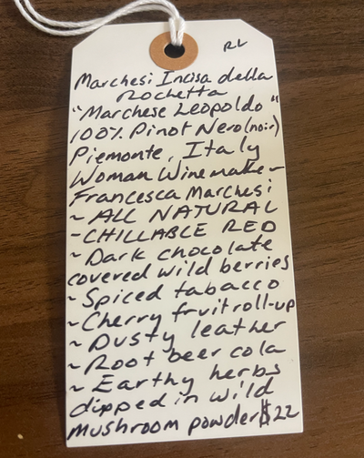 100% Pinot Nero. Piedmont, Italy.  Woman winemaker - Francesca Marchesi. Chillable red. Dark chocolate dipped wild berries. Spiced tabacco. Cherry fruit roll-up. Dusty leather. Rootbeer cola. Earthy herbs dipped in umami mushroom powder.