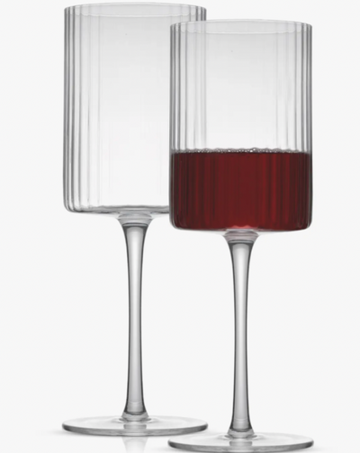 Ritzy bar glasses in a fluted origami style glass cup design. These are crafted with care in Czech Republic from premium quality, highly durable crystal. Dishwasher Safe.