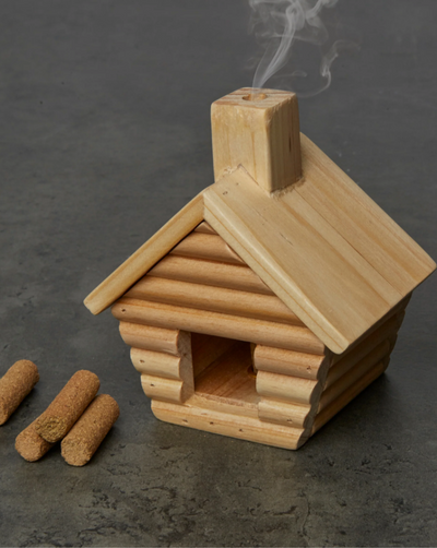 The log cabin you always wanted! Light a stick of incense & watch smoke rise from the chimney. Comes with 10 short balsam fir incense sticks and a single incense stick holder at the base.
