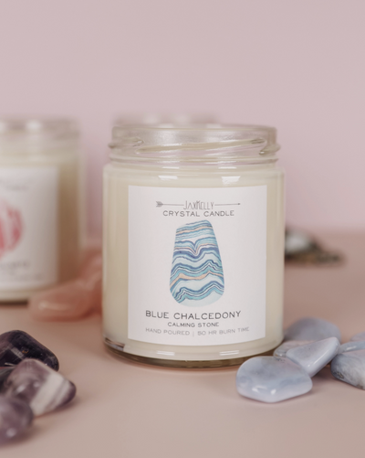 Hidden inside is a Blue Chalcedony that radiates calming energy. Once your candle has burned retrieve your tumbled stone and carry it with you, or place it in a special space to manifest feelings of serenity.