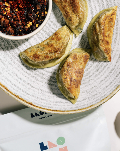 Handmade Vegetarian Dumplings made with bok choy, shiitakes, scallions, and Chinese chili crisp. Laoban is a modern take on a traditionally-inspired Chinese dumplings.