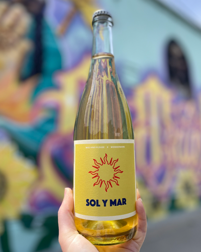 100% Vermentino San Benito, California.  Woman winemakers - Andrea Jaramillo All natural. Orange Wine A little sparkling. A tropical sun tanned bikini beach babe on spritzy shore misted by a salty ocean breeze. Pina Colada wine vibes. Smashed cucumbers in mixed citrus juice. Crushable queen. Ripe pomelo.