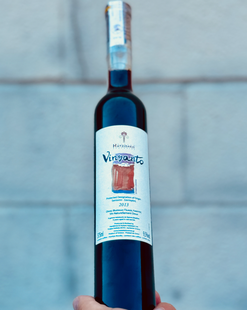 80% Assyrtiko 20% Aidani Santorini, Greece.  Women in wine -Konstantina Chryssou. All natural. Dessert Wine Roasted toffee. Candied orange peels. Golden raisins and dried figs. Velvety caramel richness with surprising freshness.&nbsp;