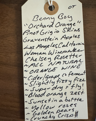 Pinot Grigio Grapes Skins and Gravenstein Apples. Los Angeles, California.  Women winemakers - Chelsea Rosetter. All natural. Orange Wine Pét-Nat (bubbles) Wine and Cider Co-ferment. Low ABV 7% Super DRY and fly. Blood orange zest. Yellow roses. Golden pears. Sunset in a bottle.