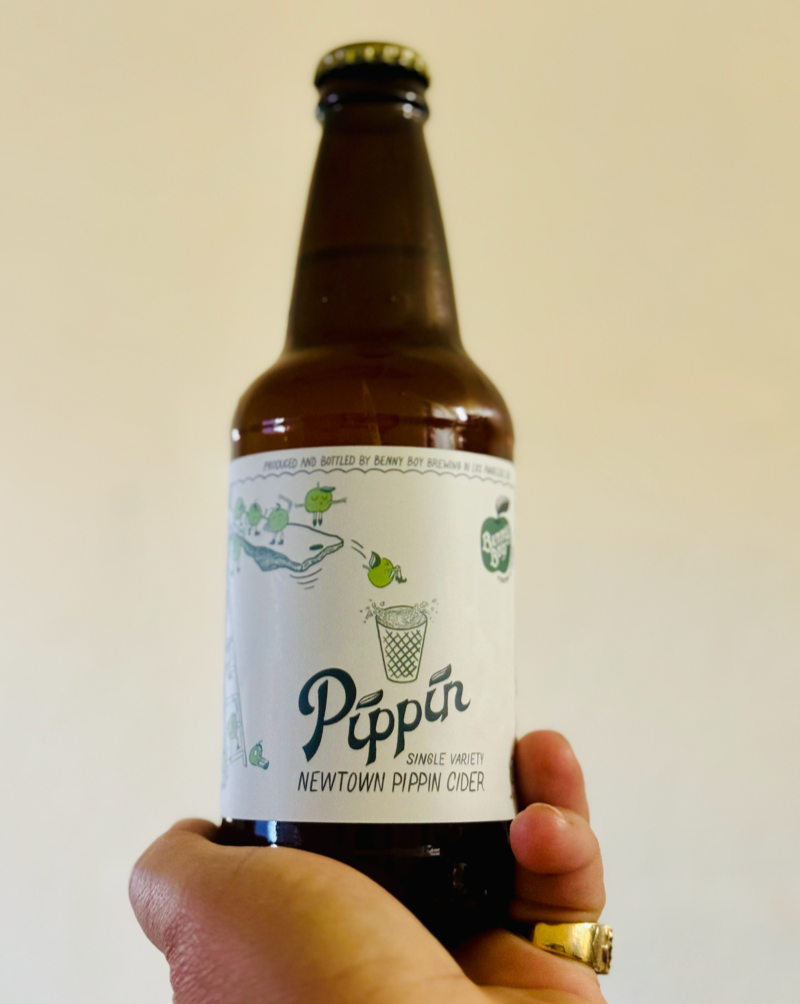 Single Variety: Newtown Pippin Apples. Los Angeles, California.  Women winemakers - Chelsea Rosetter. All natural. DRY apple cider. Crisp, tangy and tasty just how you want it! Hazy for lazy days and nights. Not your drunk cousin in college's Angry Orchard.