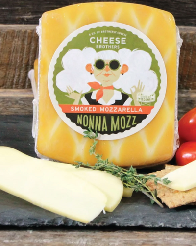 Smoldering with passion, Nonna Mozz weaves murky tales of times long past to any gathering. Made the old-fashioned way in our Wisconsin packhouse, this naturally smoked mozzarella cheese is worthy of Nonna's name. Use it to deepen and expand the flavor of pizzas or serve on its own with smoked meats. Net weight: 6 oz. Origin: Stanley, Wisconsin Age: 2 - 12 months Flavor: Naturally smoked, rich, smooth Best with: Panini and sandwiches, pizza, meat and cheese plates