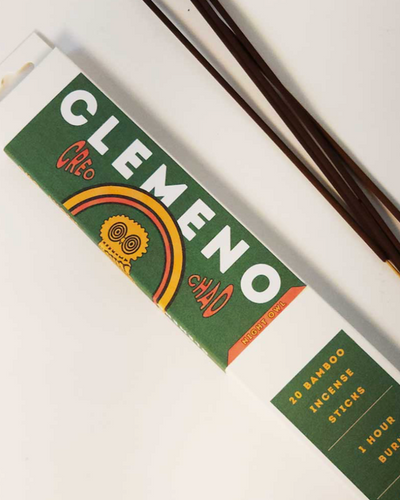 Clemeno incense packaging with green and white design on a white surface.