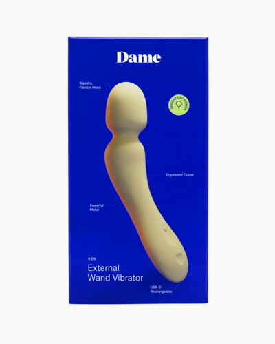 Dame external wand vibrator packaging with blue background and beige vibrator