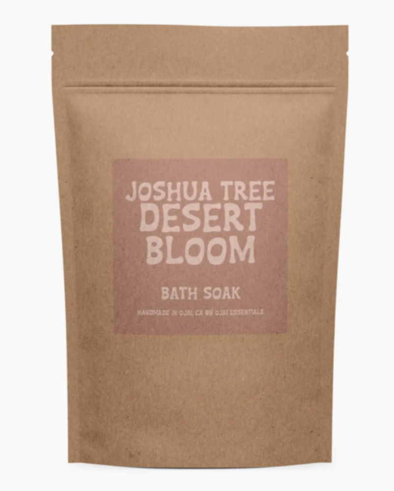 Brown paper bag with 'Joshua Tree Desert Bloom Bath Soak' text on a white background