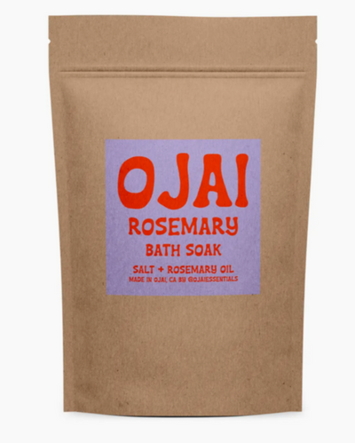 Kraft paper packaging of OJAI Rosemary Bath Soak with a purple label.