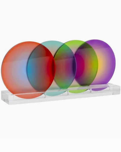 Set of four multicolored lenses on a white background