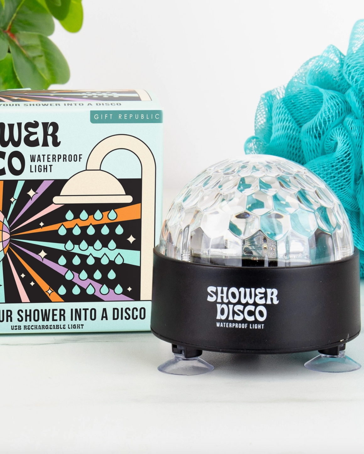 Shower disco light with packaging and a blue loofah on a white background