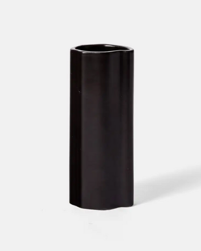 Black cylindrical vase on a white background