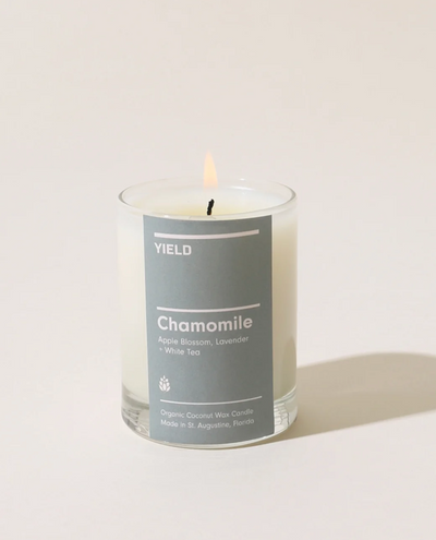 Candle with a gray label on a white background