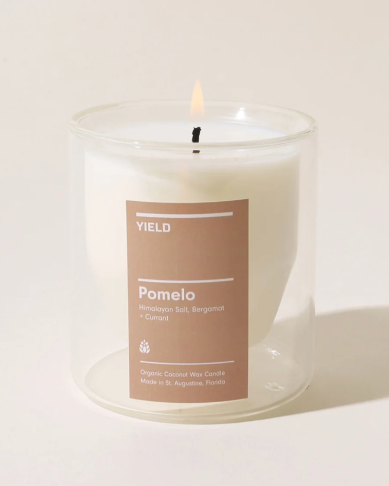 Candle with a label on a white background