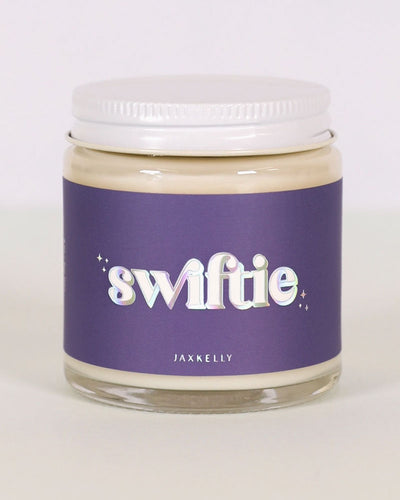 Swiftie is a mood-lifting blend of citrus, invigorating green grass, and comforting vanilla meant to cheer you up or help you wind down! Whether you're partial to one album, or listening to all the Eras in order, this candle smells like how Tay's lyrics make us feel!