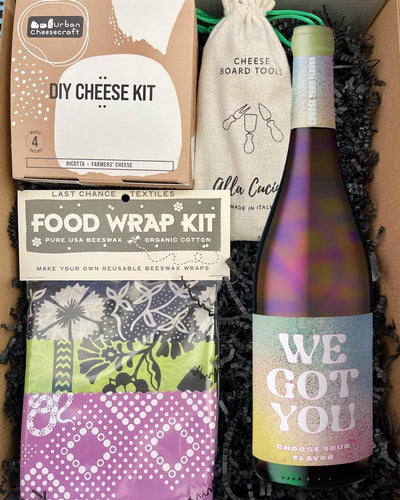This box includes Urban Cheesecraft Mini Cheese Kit, Last Chance Textiles DIY Beeswax Food Wrap kit and Verve italian Cheese Board Tools Set of 3.  YOU PICK: Choose the flavor of wine you'd like included in this box, and we'll select the perfect bottle.