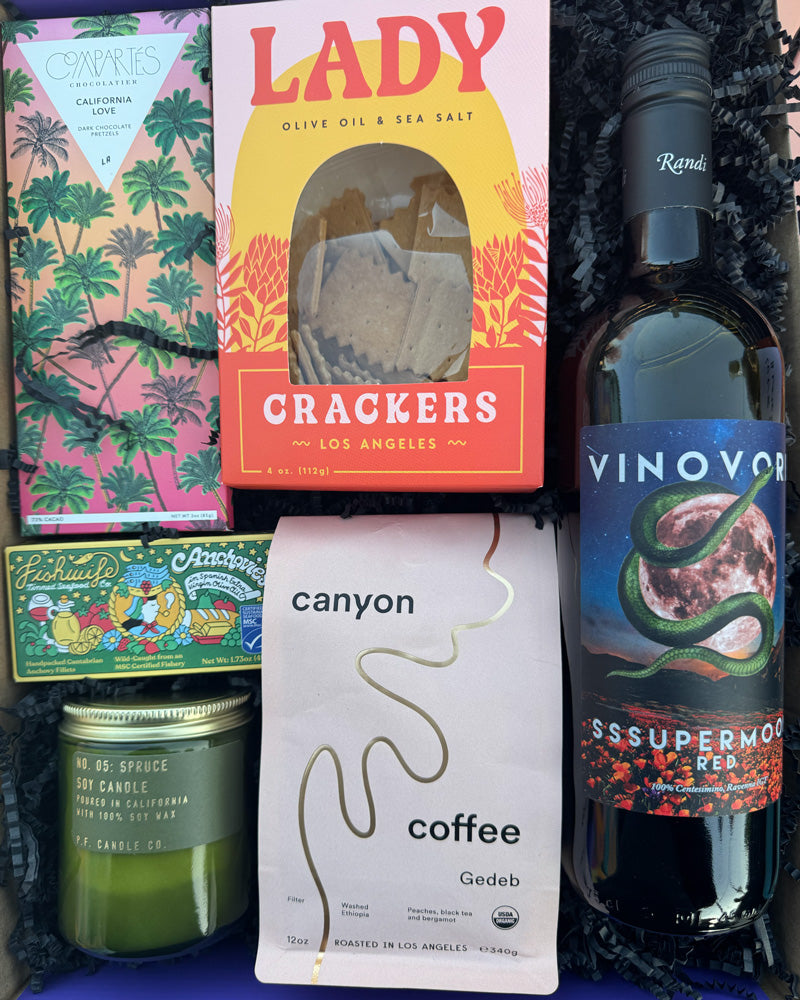 Our Local Love Sssupermoon Box includes:

Compartés California Love Dark Chocolate Salted Pretzel Bar, Fishwife Anchovies in Spanish EVOO, P.F. Spruce Jar Candle, Gedeb Canyon Coffee, and Lady Larder Lady Crackers

*Substitutions of similar items may be made if products shown in this box are sold out at the time of ordering.