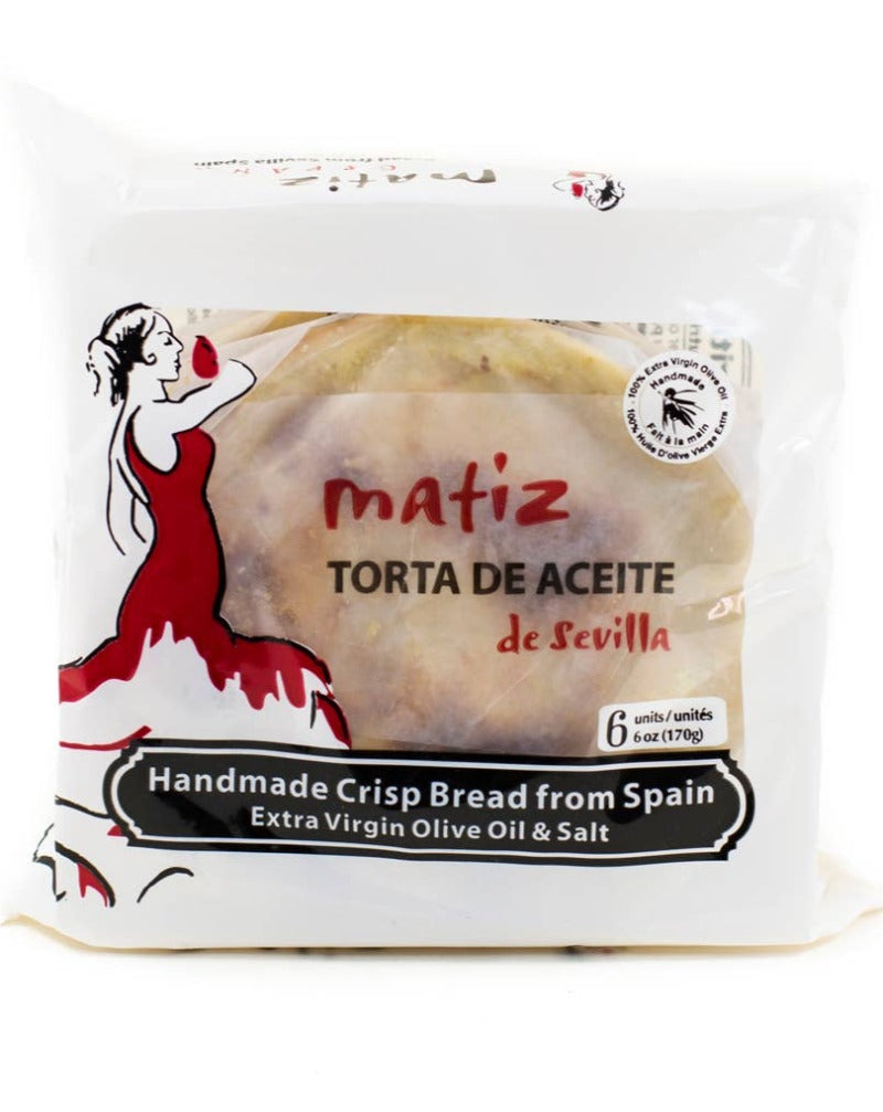 Handmade traditional savory Spanish crispbread from Andalucía made with olive oil and salted. Perfect with cheeses and charcuterie. Tortas de aceite are a traditional Spanish crisp bread, light and flaky, made with over 25% Spanish olive oil.