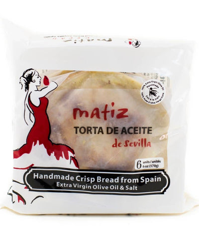 Handmade traditional savory Spanish crispbread from Andalucía made with olive oil and salted. Perfect with cheeses and charcuterie. Tortas de aceite are a traditional Spanish crisp bread, light and flaky, made with over 25% Spanish olive oil.