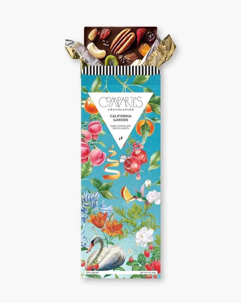 CALIFORNIA GARDEN BAR: Indulge in all the beautiful flavors and textures of a California summer garden with this vegan dark chocolate bar. Studded with a variety of fruits and nuts from California’s best farmers markets and gardens, every delightful bite will encompass the vibrant and tangy flavors of summer.