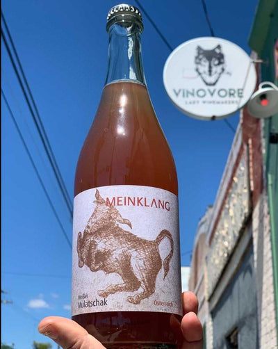 Pinot Gris, Welschriesling, Traminer Burgenland, Austria.  Woman winemaker - Angela Michlits. All natural. Orange wine. "Mulatschak". Guava Goddess. Life of the party so join in! Crackling + sizzling grapefruit piff. Less than a gram of sugar.