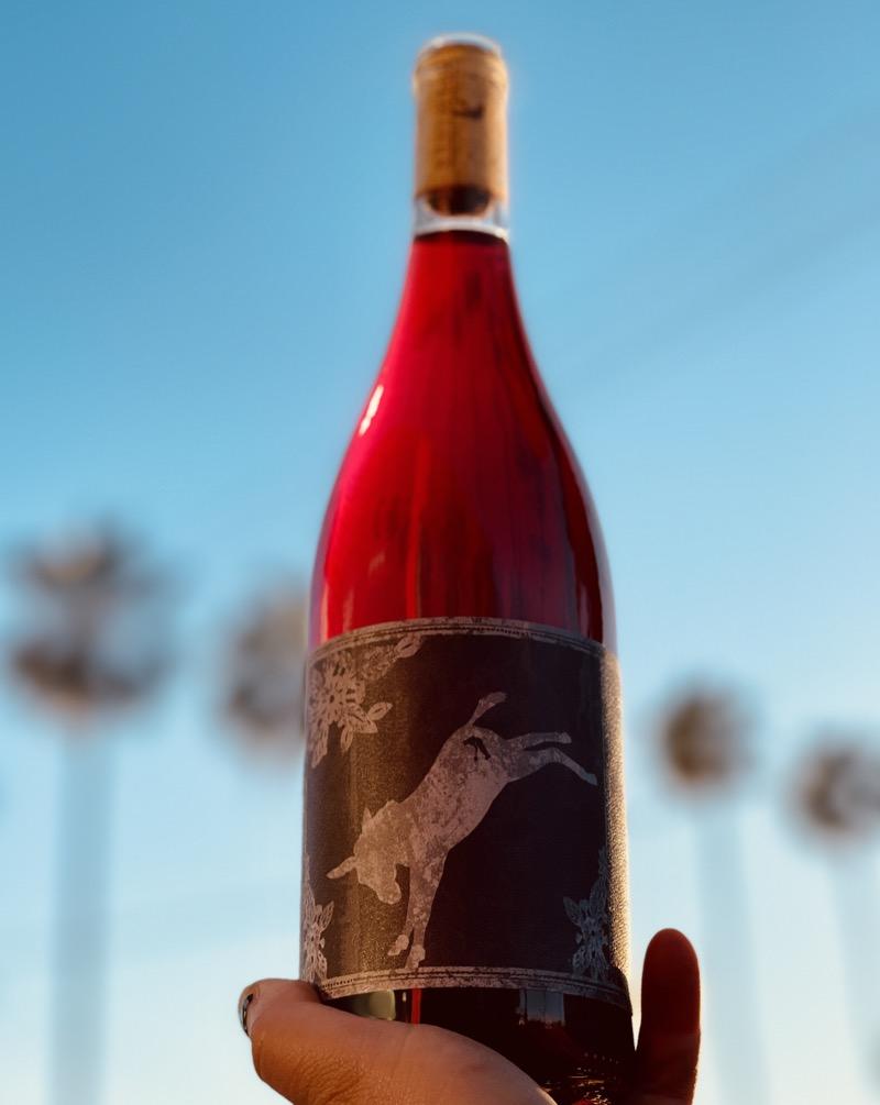 100% Carbonic Syrah Santa Barbara, California.  Woman winemaker - Anna Delaski. All natural. Chillable red. Fun, racy and zippy like a 1976 Porche on PCH. Completely dry yet delightfully fruity and alive. Mouthwatering and crushable strawberries.