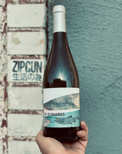 100% Albariño. Rías Baixas, Spain.  Woman winemaker - Chris Yagüe. All natural. Dried Hay. Queer made. 120 year old vines. Salty like a smack of sea air in your mouth. This wine has bananas B-A-N-A-N-A-S.