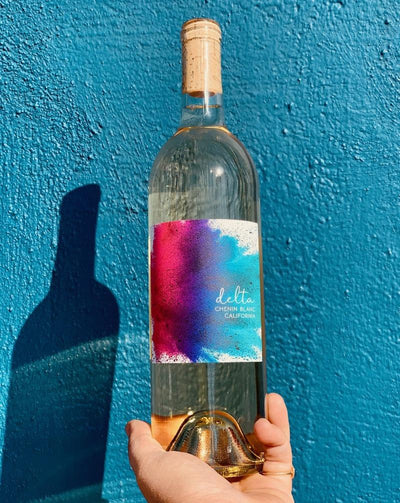 100% Chenin Blanc. Central Coast, California.  Woman winemaker - Alexis Iaconis. All natural. Barlett pear tart. Jasmine + apricots. Lemon verbena. Blood oranges. Untamed and juiced up - she's got her party dress on and is ready to go-go!