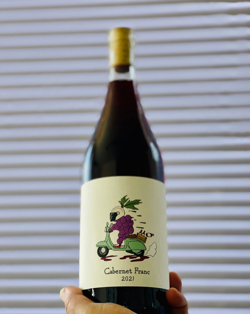100% Cabernet Franc Clarksburg, California.  Woman winemaker - Shelbi Herring. All natural. Chillable Red. Like a motor scooter of cherries, red apples and raspberries zipping and zooming through a rose petal and pink peppercorn wonderland.