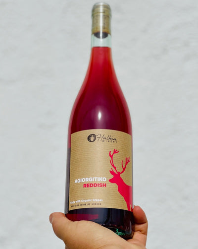 100% Agiorgitiko Nemea, Greece.  Woman winemaker - Anna Halkia. All natural. Chillable red. Maple-berry spritz. Funky + quaffable. Greek gamay. Cinnamon spice. Mineral visions + rhubarb tongue. Smoked, chilled raisenettes.
