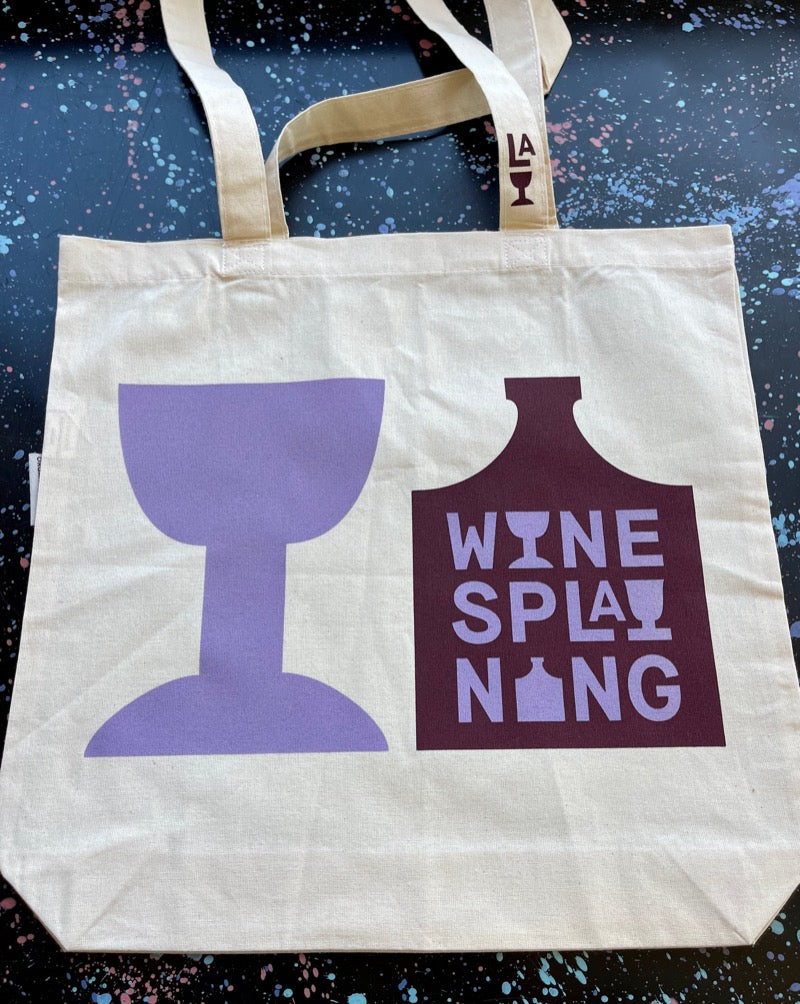 Winesplaining podcast signature tote bags. Toss your goodies in our lightweight cotton tote.