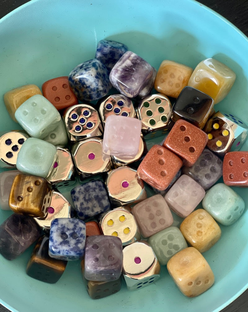 These unique crystals are fun to roll. Real crystal dice with their own unique qualities, tigers eye, yellow jasper, rose quartz, amethyst, sodalite, green aventurine,  gold stone and zinc alloy dice!
