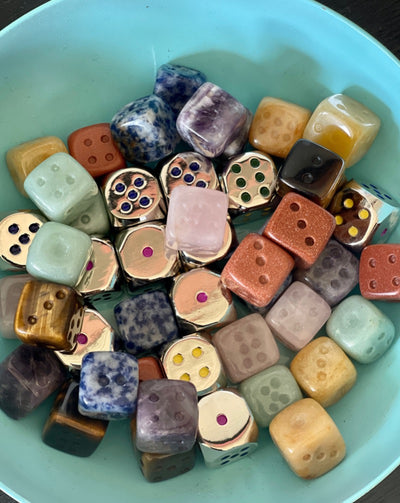 These unique crystals are fun to roll. Real crystal dice with their own unique qualities, tigers eye, yellow jasper, rose quartz, amethyst, sodalite, green aventurine,  gold stone and zinc alloy dice!