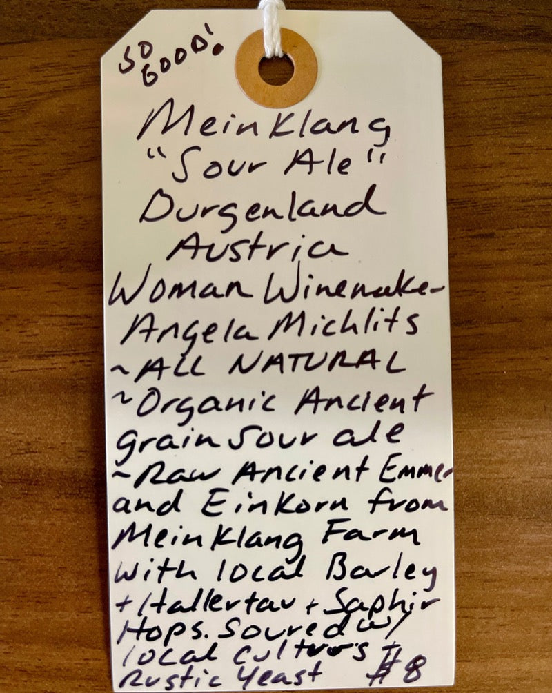 Burgenland, Austria.  Woman winemaker - Angela Michlits. All natural. Raw Ancient Emmer & Einkorn from Meinklang Farm, combined with local Barley and hopped with local Hallertau Tradition & Saphir. Soured with lactobacillus cultures and fermented with a rustic farmhouse yeast.