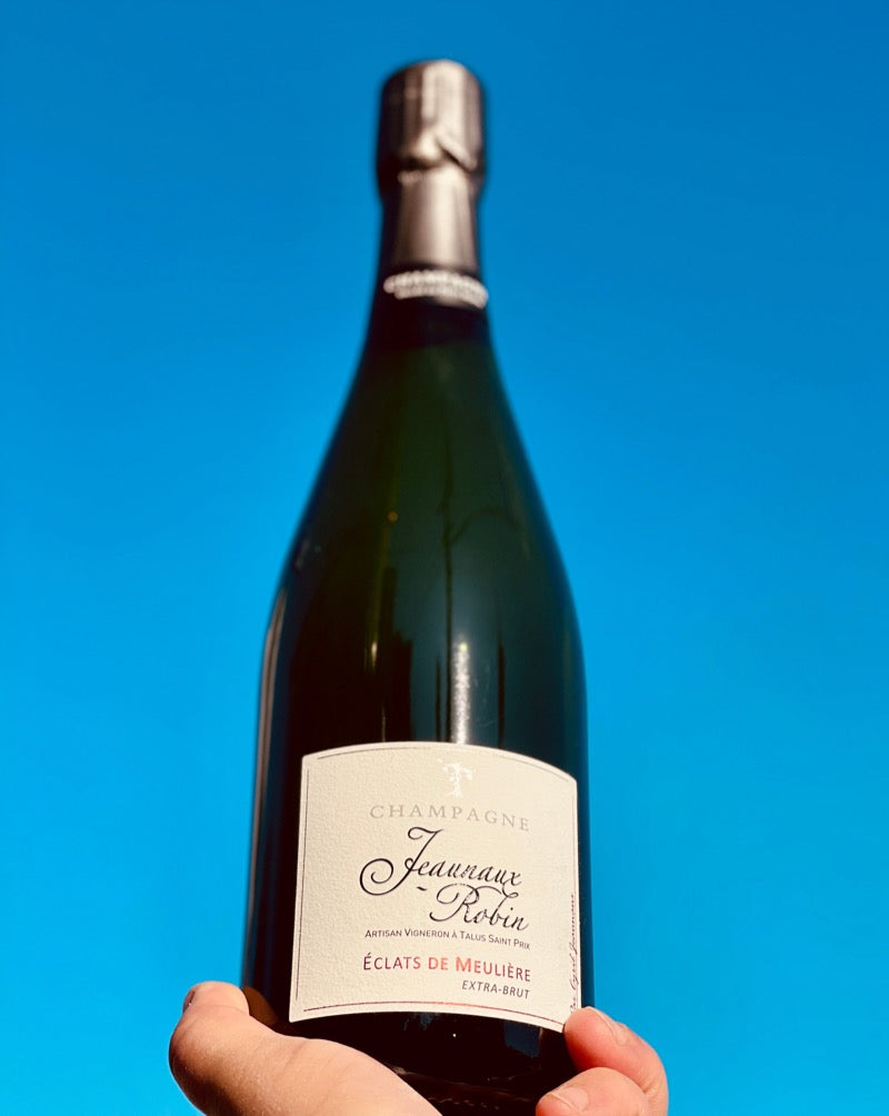 Extra Brut. 60% pinot meunier, 30% pinot noir, 10% chardonnay. Champagne, France.  Woman winemakers  - Clemence Jeaunaux Robin All natural. Growers Champagne Juicy, drippy peaches. Not sweet wildflower honey and apricots. Yeasty, crusty bread. Smoky stones. Yellow raspberries. Lick of lemon.