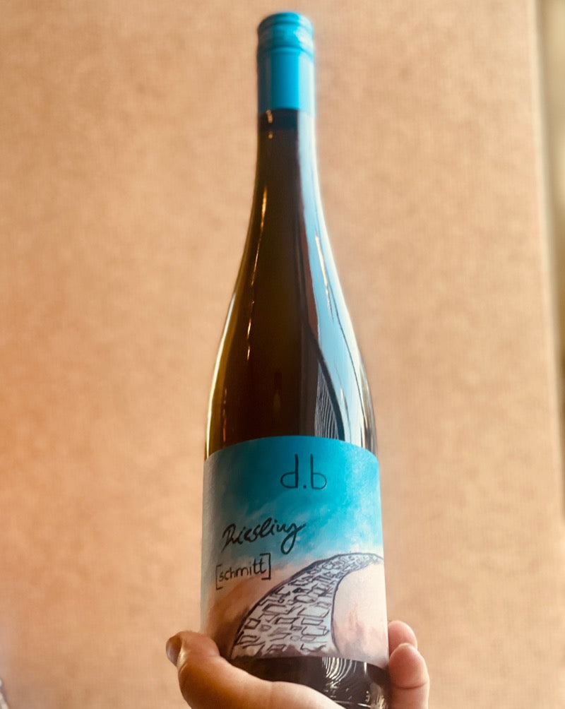 100% Riesling Rheinhessen, Germany.  Woman winemaker - Bianka Schmitt. All natural. Caramel Apple. Yellow cherry Jam. Rhubarb zippy mouth flips. Grapefruit dryness. Lemon whip. Pina Colada vibes. Petrol and dough.