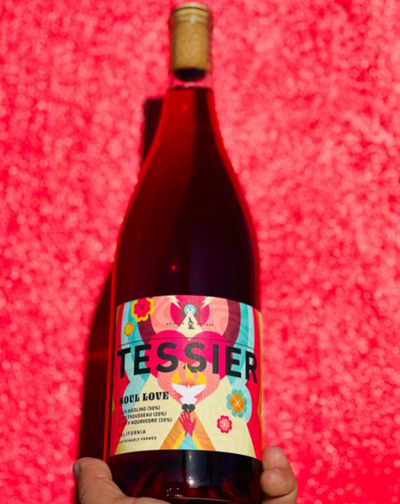 70% Riesling. 25% Mourtaou. 5% Merlot Arroyo Seco, California.  Woman winemaker - Kristie Tracey. All Natural. Chillable red/white. This limited and lovely Tahitian punch blaster is dripping with wild herbs & huckleberry kisses. Wet rocks + guava.