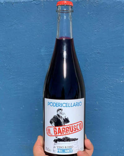 Neretta (rare) /Barbera/Dolcetto Piedmont, Italy.  Woman winemaker - Cinzia Cellario. All natural. Pét-nat (bubbles). Chilled red. Rough and tumble sparkle explosion of spice + dark fruit. Vibrant with dusty tannins.