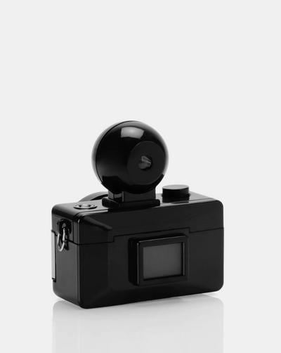 With a sleek black metallic design, the oh-so-adorable Fisheye Baby 110 Camera may be small, but it packs a 170-degree punch, shooting super-cool bulbous spheres on 110 film.