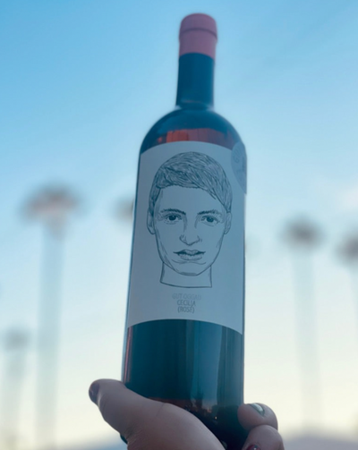 Red and White Grape field blend. Burgenland, Austria.  Woman winemaker - Stephanie Tscheppe. All natural. Meet Cecilia! A new family member! To taste her is to love her. Her soil releases a distinct character making her a stoney cold fox of mineralogy. Dry, crunchy, bright.