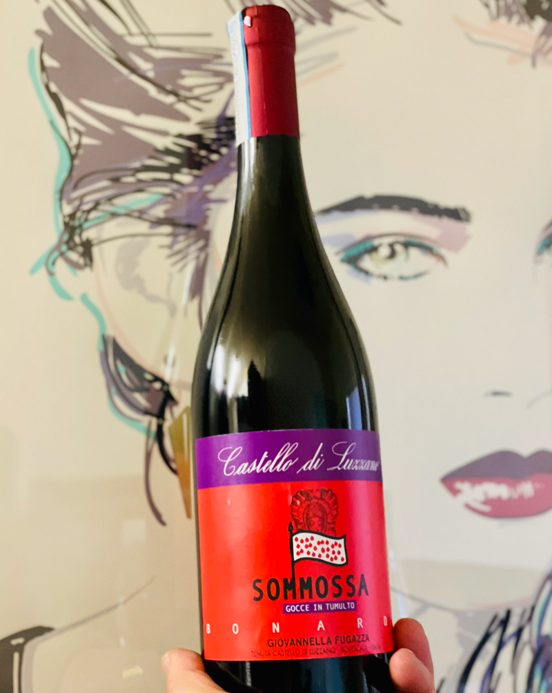 100% Bonarda Rovescala, Italy.  Woman in wine - Giovannela Fugazza. All natural. Chillable red. Frizzante - Fizzy, light and fresh bubbles. Half cherry cola and half Dr. Pepper from the fountain at 7-11. Dried dates. Peppery blueberry. Tamarind hibiscus. Roasted poblano.