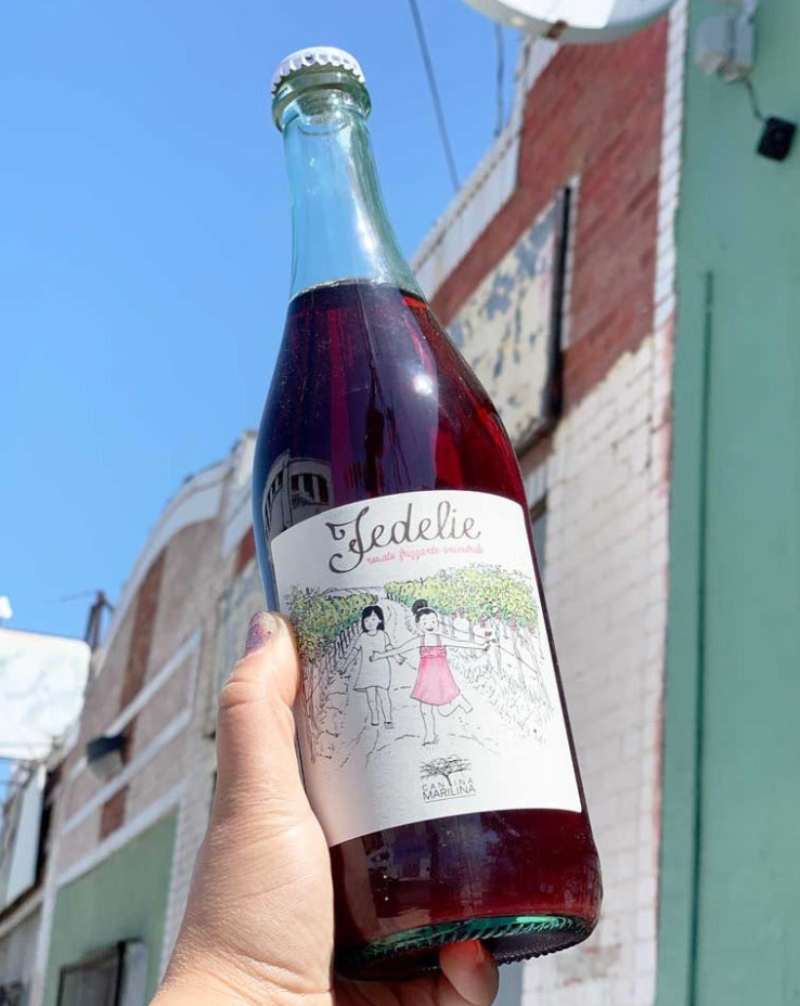 100% Nero d'Avola Sicily, Italy.  Woman winemakers - Frederica + Marilina. Pét-nat Rosé. All natural. Organic/biodynamic. Exploding black cherry lava love. Dirty + dry. Light fizz. Lime zest.