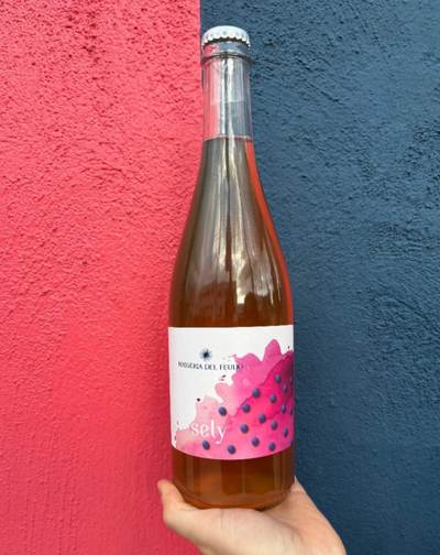 100% Nero d'Avola Sicily, Italy  Lady winemaker - Carolina Cucuvullo All natural. Pét-nat. If strawberry shortcake and a mermaid (or merman) had a baby. Dry and peachy. Zingy and taut. Fresh + naughty. 