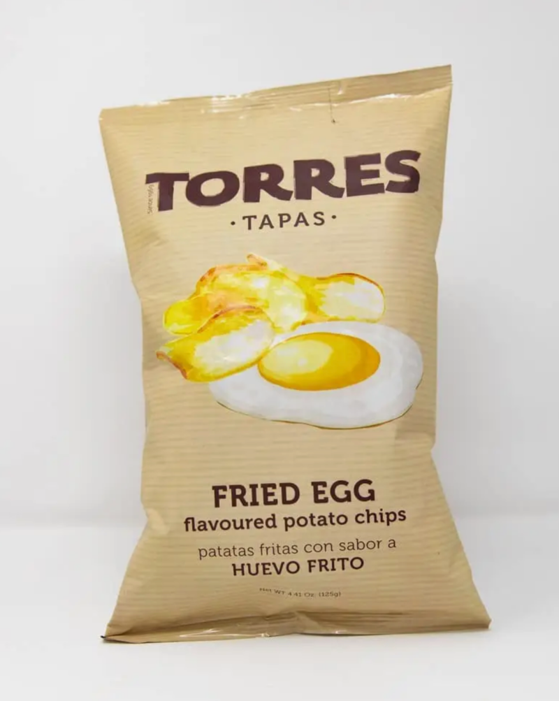 Imported from Spain, Torres Potato Chips are light and crispy with bold flavors. These fried egg crisps from Torres will be the talk of your dinner or cocktail party! These golden crisps have the rich savory flavour of a freshly fried egg - we couldn’t believe it either but they really do! The taste of fried eggs is delightfully weird - and makes these chips completely irresistible. 