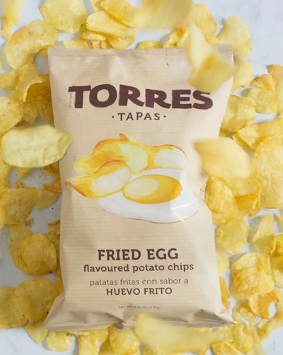 Imported from Spain, Torres Potato Chips are light and crispy with bold flavors. These fried egg crisps from Torres will be the talk of your dinner or cocktail party! These golden crisps have the rich savory flavour of a freshly fried egg - we couldn’t believe it either but they really do! The taste of fried eggs is delightfully weird - and makes these chips completely irresistible. 