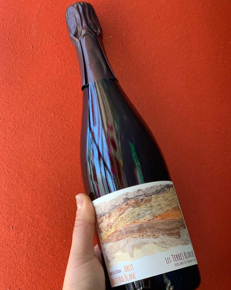 100% Chenin Blanc Loire, France.  Woman winemaker - Celine Blet. All natural. Organic farming. Distinct terroir. Dried apricots + roasted nuts. Briney uni. Savory + Meyer lemons. Salty apples.