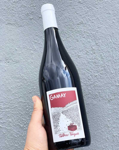 100% Gamay Loire, France.  Woman winemaker - Valerie Forgues. All natural. Chillable red. Blessed be the fruit. Red Raspberry slurry + dirt. Savory + smooth. Delectable, delightful and a mineral queen.